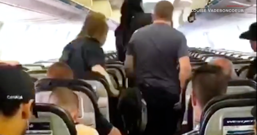 Rare Footage of People Getting Off a Plane in a Calm and Orderly Fashion