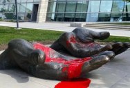 Red Paint Completely Changed This ‘Serve and Protect’ Sculpture During the Protests