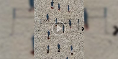 This Overhead Video of a Beach Volleyball Game Looks Like Shadows Playing