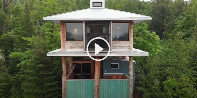 Amazing 2 Story Treehouse Built From 20 Years of Collecting Scrap Materials