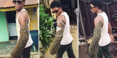 Guy Casually Walks Down the Street with Arm Covered in Bees