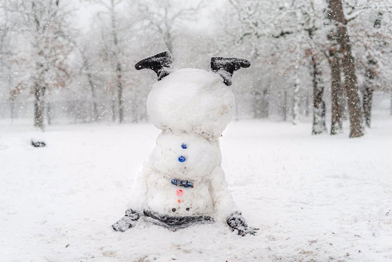 snow storm in austin texas jan 10 2021 snowman doing cartwheel Austin, Texas Got Nearly 2 Inches of Snow on Sunday