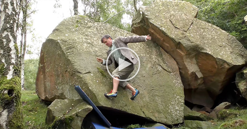 Guy in Tweed Suit Channels His Inner Goat to Climb Boulders with No Hands