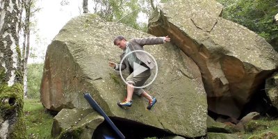 Guy in Tweed Suit Channels His Inner Goat to Climb Boulders with No Hands
