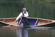 If You Need a Lift, Watch this Gentleman in a Tux Freestyle Canoe to Lady in Red