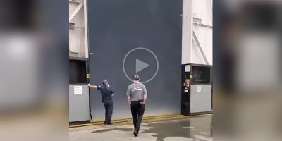 The Rain Storm Outside of this Factory Door in Alabama is Crazy