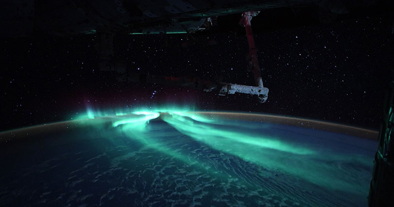 An Astronaut Captured the Southern Lights Under a Full Moon and They're Stunning