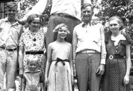 A Photo of the Tallest Man in Recorded History with His Family ca 1935