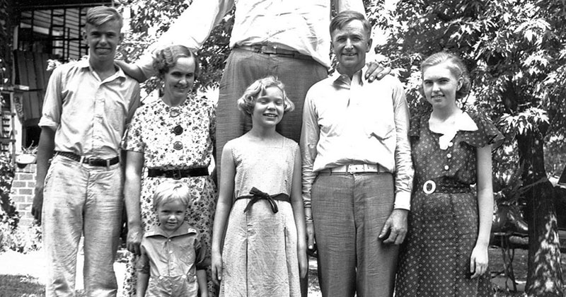 A Photo of the Tallest Man in Recorded History with His Family ca 1935