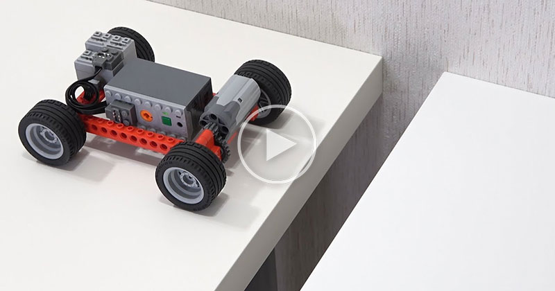 Building Lego Vehicles To Cross Progressively Longer Gaps