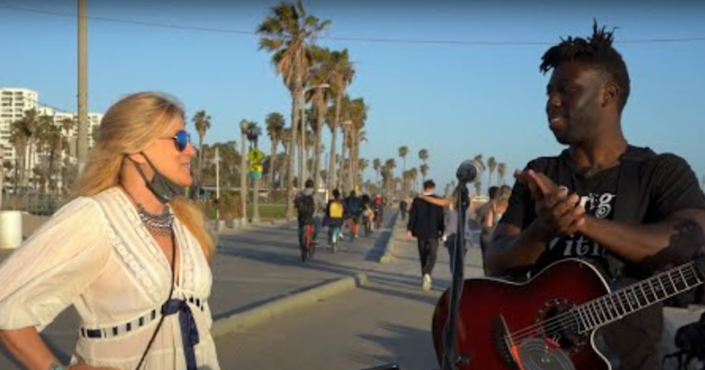 Street Musician and Woman Share Sweet Bond Performing Her Song