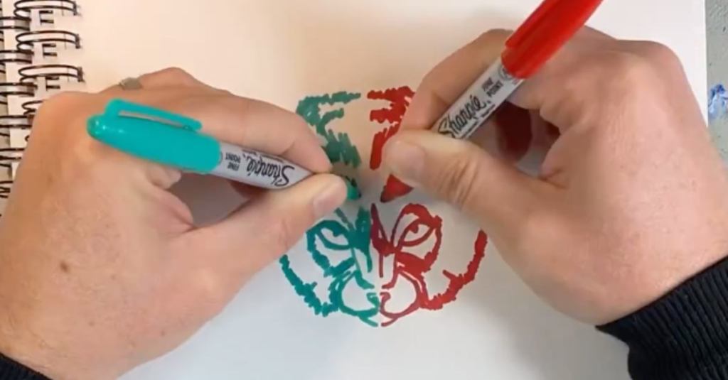 This Artist Draws Portraits Using Both Hands at the Same Time