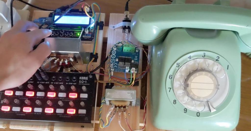 A Musical Instrument Made Out of a Rotary Telephone and a Drum Rhythm Machine