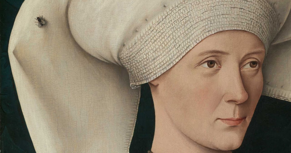 Why Does This Lady Have a Fly on Her Head?