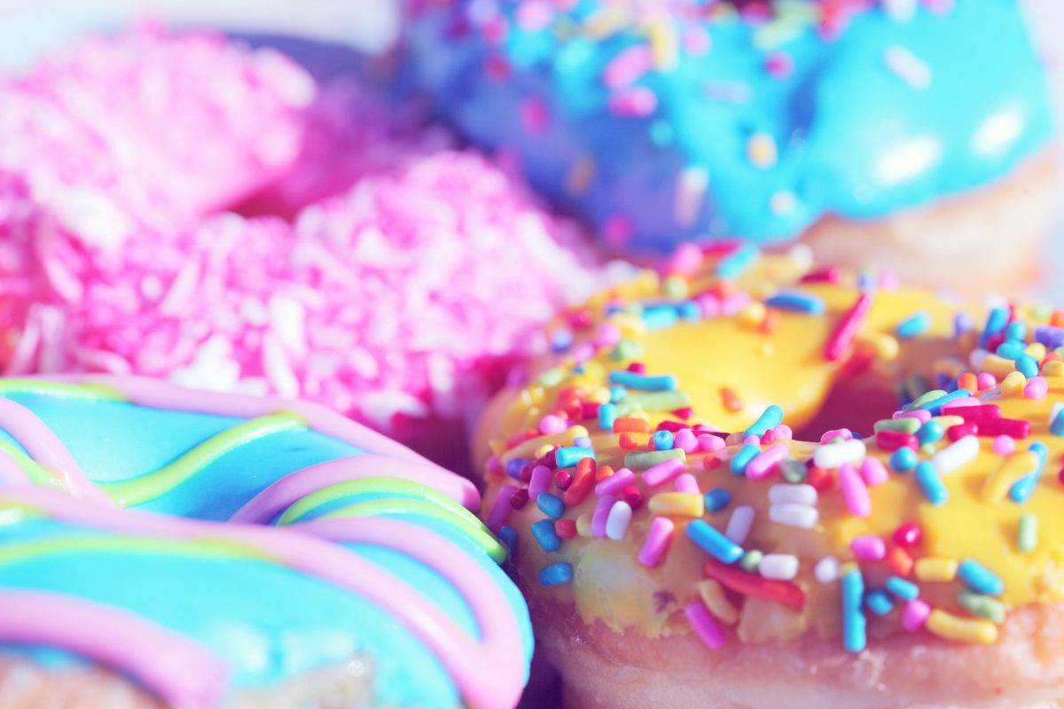 Brightly colored iced donuts