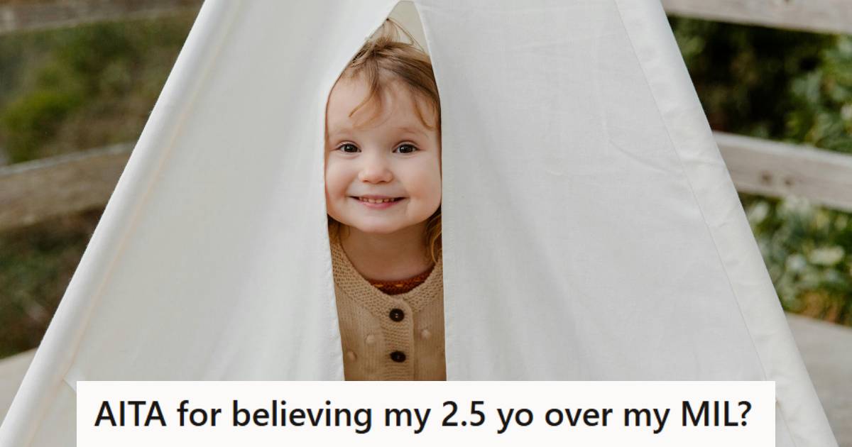 smiling child peeks out of white tent