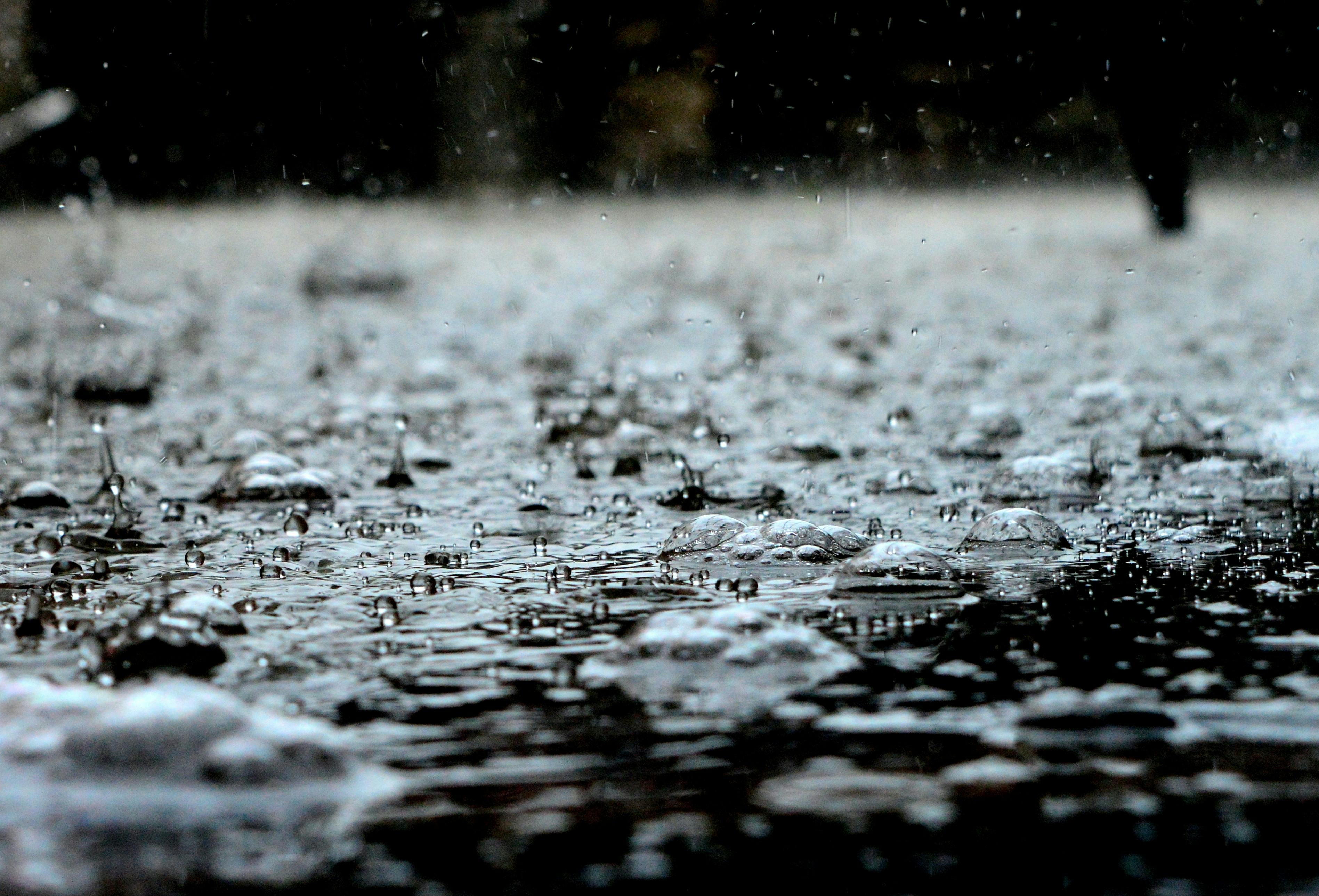 close up of rain drops on the ground