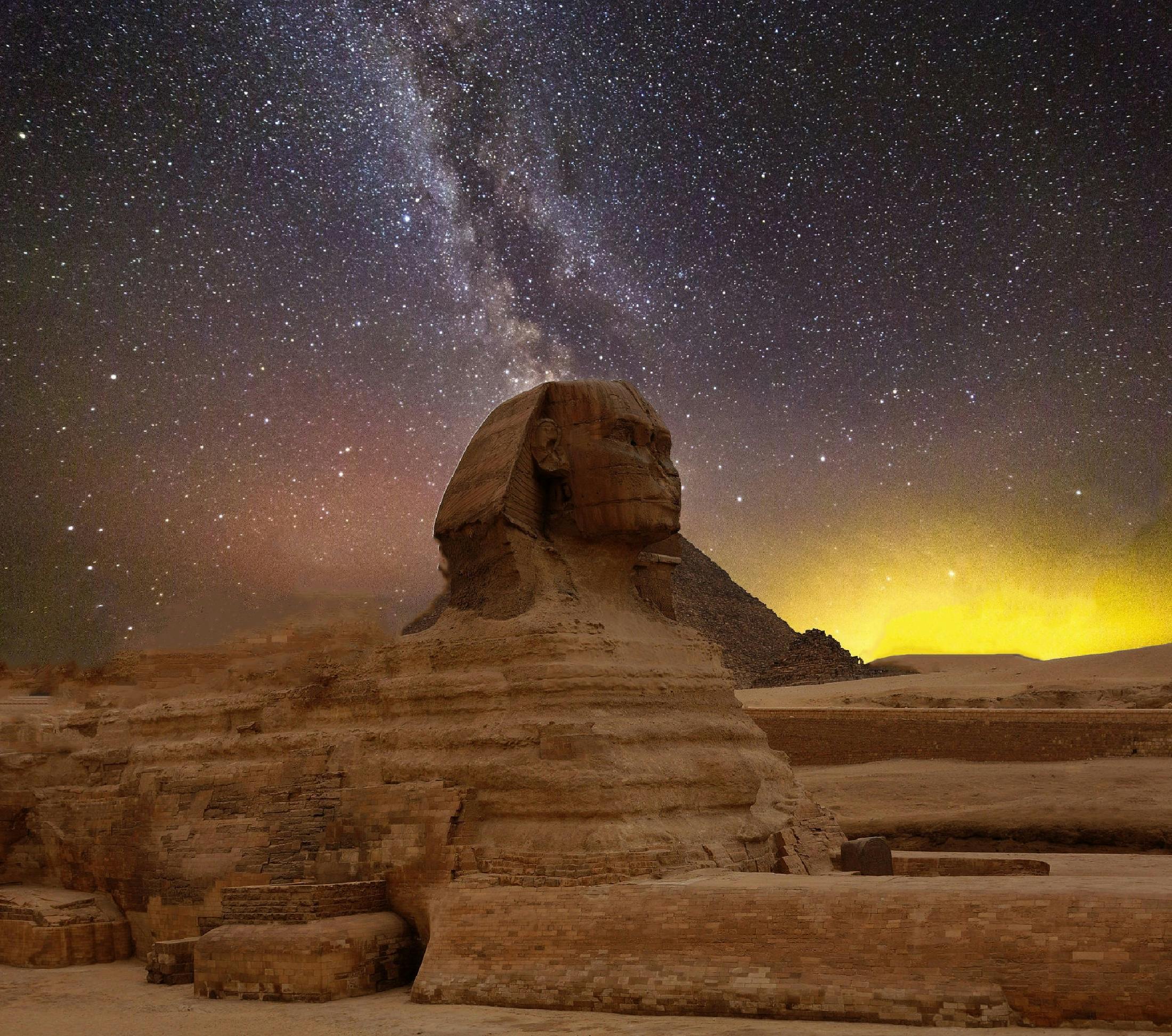 Shot of the Sphinx with a beautiful cosmos in the background