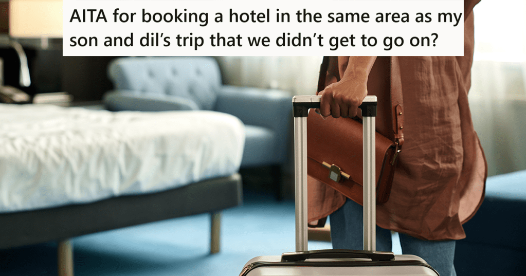 person bringing a suitcase into hotel