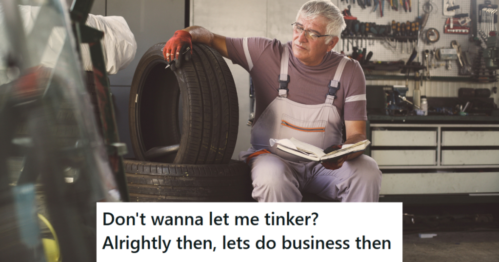 mechanic checking books