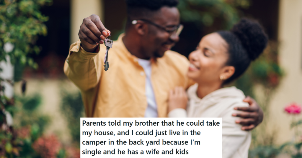 Couple holding house keys smiling