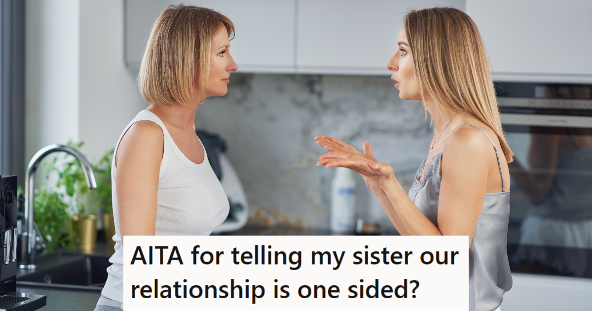 two women stand facing each other in the kitchen