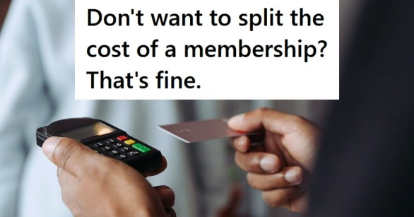 Man holding credit card machine