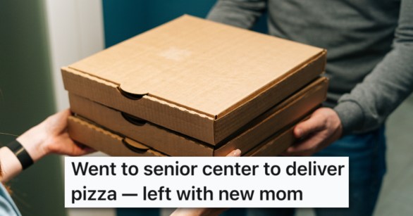 delivery man handing pizza to customer