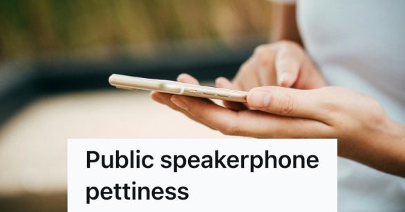 A woman presses buttons on her phone