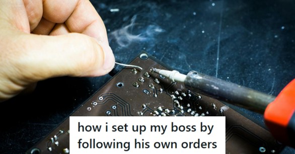 Man fixing a computer mother board