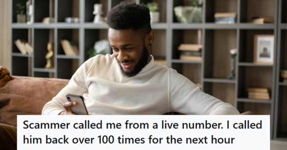 Man sitting on the couch using his cell phone
