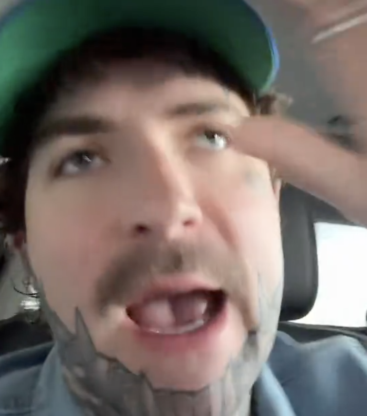 man inside a car in a car wash