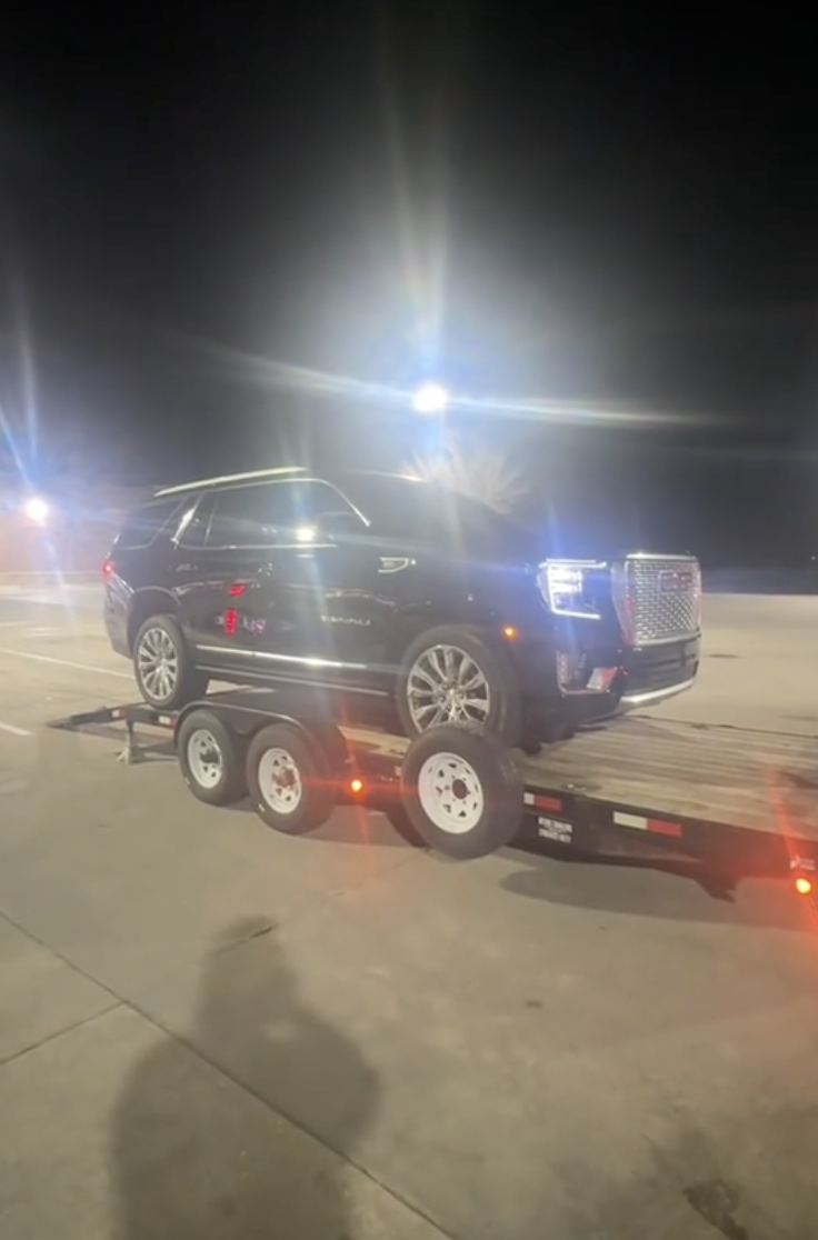 an SUV about to be towed away