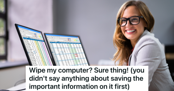 smiling woman in glasses at a computer