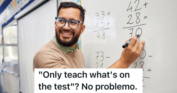 man wearing glasses teaching math at the chalkboard