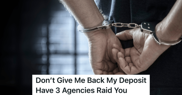 closeup of man's hands in handcuffs behind his back