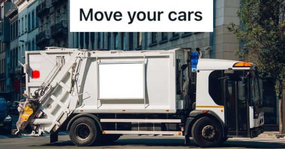 white garbage truck at the middle of the road