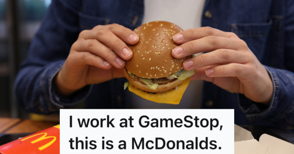 person holding a mcdonald's hamburger