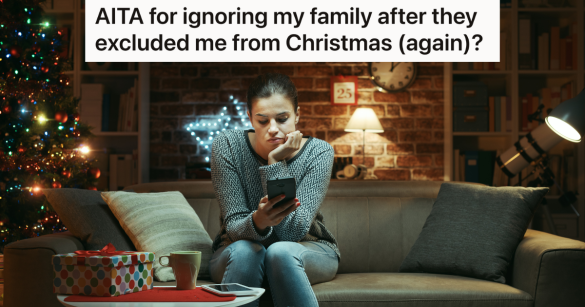 sad woman looking at phone on Christmas