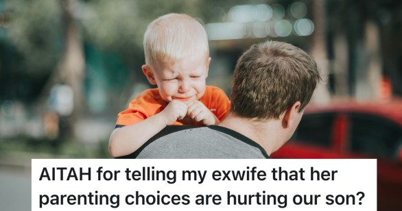 son crying on dad's shoulder