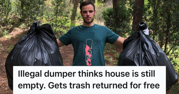 man holding two large black trash bags