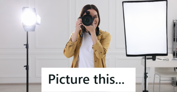 female photographer looking into camera in studio