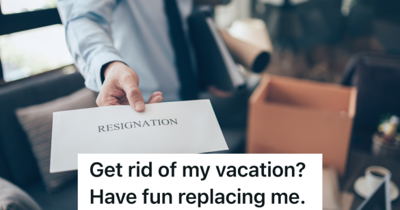 business man holds envelope that reads "resignation"