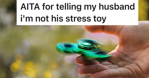 person playing with fidget spinner