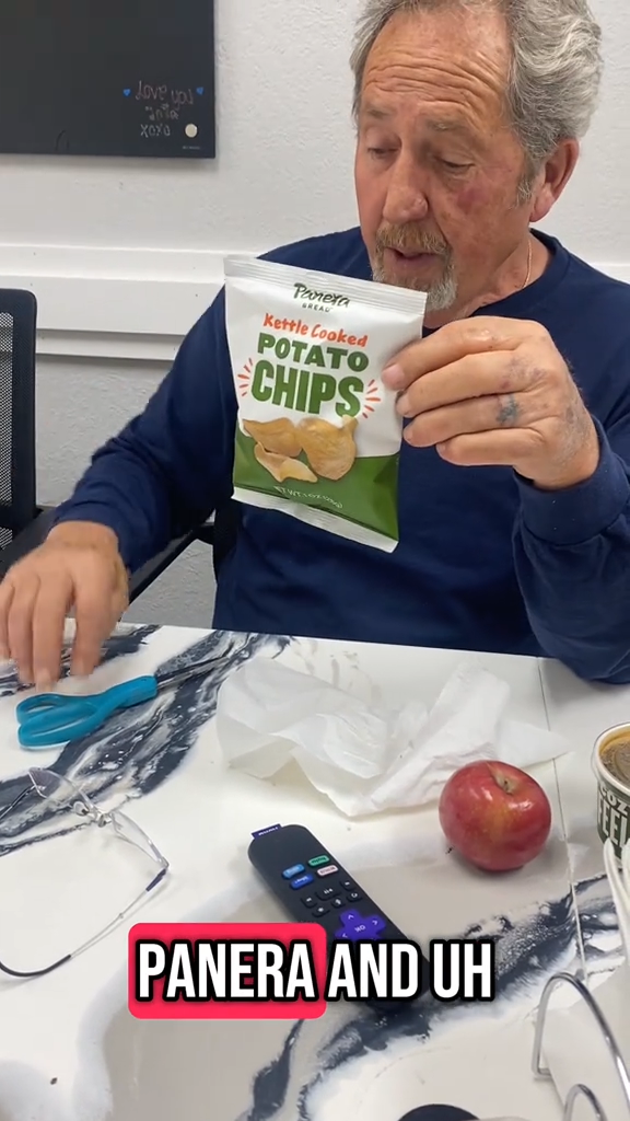 A man with a Panera chip bag