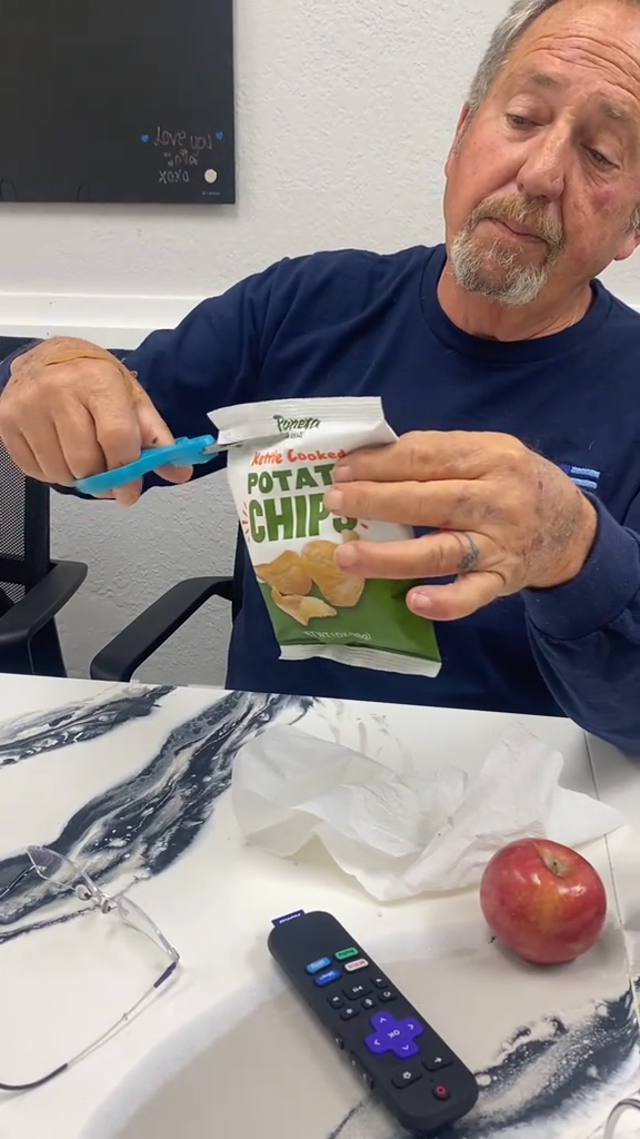 A man with a Panera chip bag