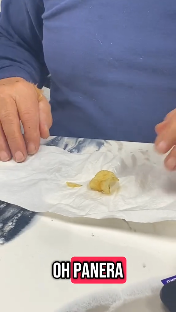 A man with a Panera chip bag