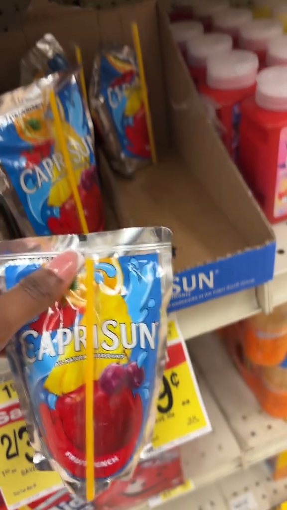 Capri Suns on a grocery store shelf