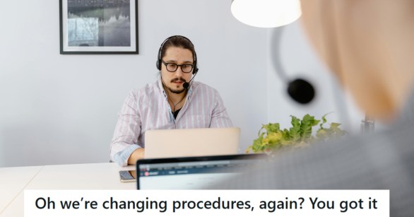 Man working in an IT call center answering phones
