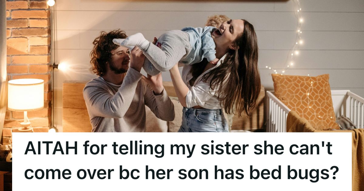 Couple playing with young son in bed